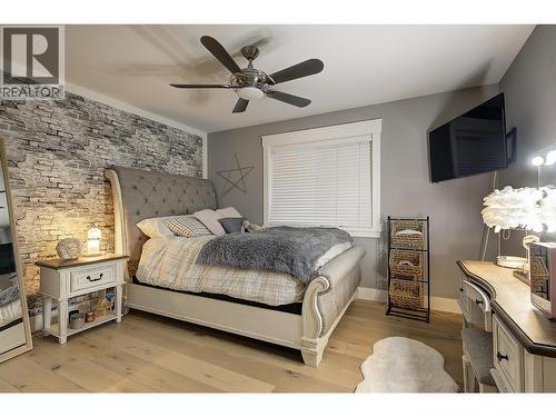 2nd bedroom upstairs - 5499 Mountainside Drive, Kelowna, BC - Indoor Photo Showing Bedroom