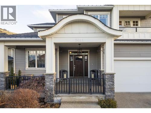 Front entry - 5499 Mountainside Drive, Kelowna, BC - Outdoor With Facade