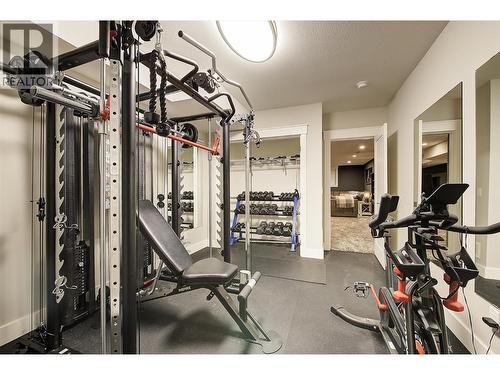 Gym / 1st bedroom downstairs - 5499 Mountainside Drive, Kelowna, BC - Indoor Photo Showing Gym Room