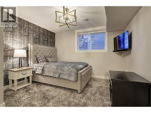 2nd bedroom downstairs - 5499 Mountainside Drive, Kelowna, BC - Indoor Photo Showing Bedroom