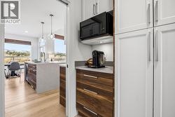 Pantry/laundry room that provides access to the garage - 