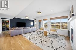 Recreation space/wet bar on the lower level featuring a 2nd cozy fireplace - 