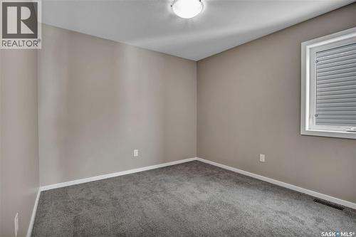 104 Reddekopp Crescent, Warman, SK - Indoor Photo Showing Other Room