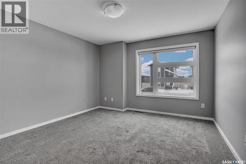 104 Reddekopp Crescent, Warman, SK - Indoor Photo Showing Other Room