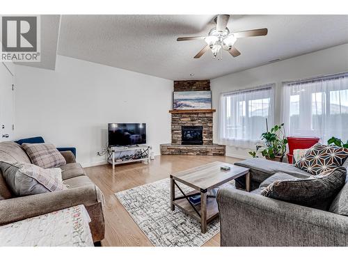 Legal Suite - 108 Red Rock Crescent, Enderby, BC - Indoor Photo Showing Living Room With Fireplace