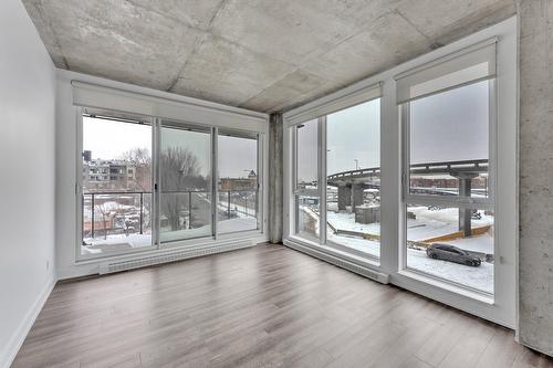 Salon - 312-1295 Rue Des Carrières, Montréal (Rosemont/La Petite-Patrie), QC - Indoor Photo Showing Other Room