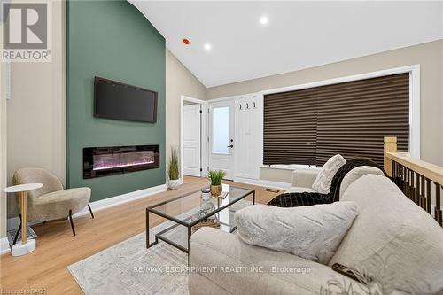 156 Walter Avenue N, Hamilton, ON - Indoor Photo Showing Living Room With Fireplace