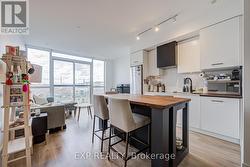 604 - 899 QUEEN STREET E  Toronto, ON M4M 0C8