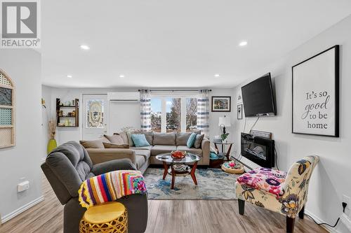 85 First Colony Drive, Cupids, NL - Indoor Photo Showing Living Room With Fireplace