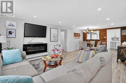 85 First Colony Drive, Cupids, NL - Indoor Photo Showing Living Room With Fireplace