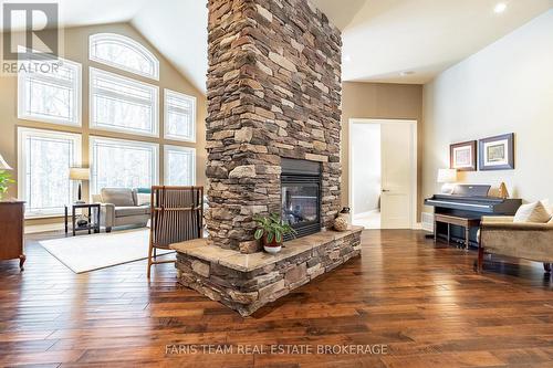 1209 Seadon Road, Springwater, ON - Indoor Photo Showing Living Room With Fireplace