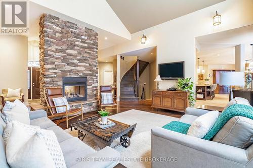 1209 Seadon Road, Springwater, ON - Indoor Photo Showing Living Room With Fireplace