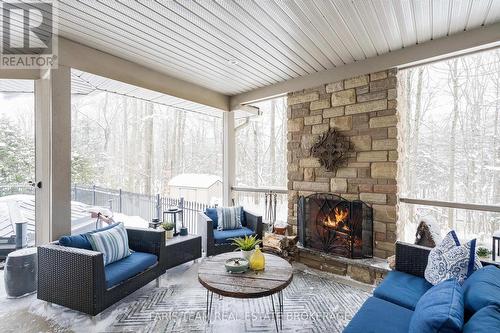 1209 Seadon Road, Springwater, ON - Indoor Photo Showing Living Room With Fireplace