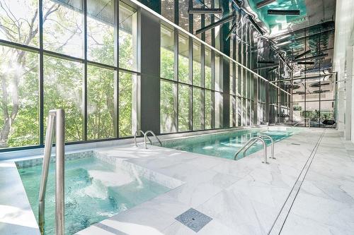 Pool - 712-2020 Boul. René-Lévesque O., Montréal (Ville-Marie), QC - Indoor Photo Showing Other Room With In Ground Pool