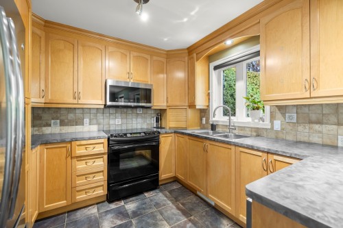 Cuisine - 259 Rue Des Plaines, Les Coteaux, QC - Indoor Photo Showing Kitchen With Double Sink