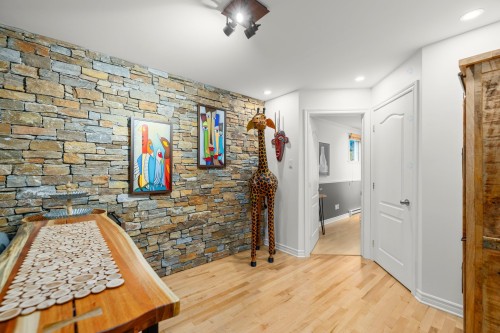 Salle familiale - 259 Rue Des Plaines, Les Coteaux, QC - Indoor Photo Showing Other Room