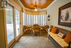 Sunroom, sliders to the patio - 