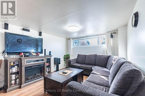 3800 Wyewood Road, Mississauga, ON - Indoor Photo Showing Living Room With Fireplace