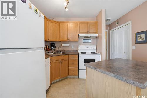 3281 Woodhams Drive E, Regina, SK - Indoor Photo Showing Kitchen With Double Sink
