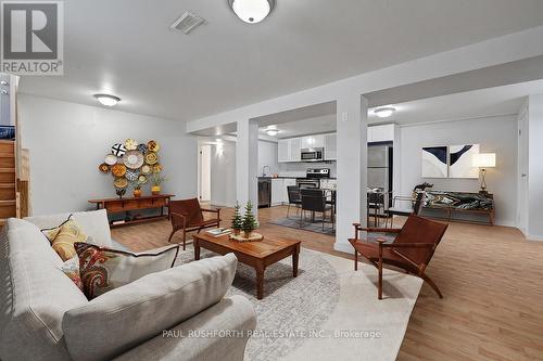 Virtually Staged-Living Area - 892 Baseline Road, Ottawa, ON - Indoor Photo Showing Living Room