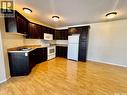 108 2Nd Avenue, Kelvington, SK  - Indoor Photo Showing Kitchen With Double Sink 