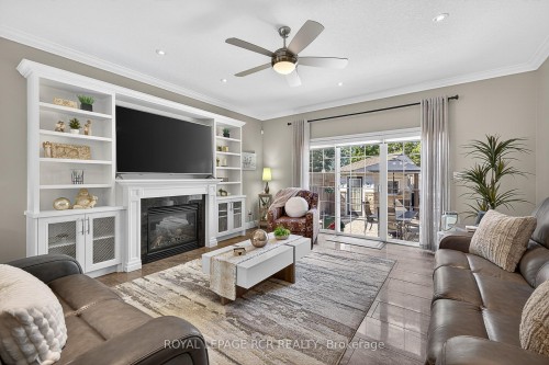 21 Corvinelli Drive, Whitby, ON - Indoor Photo Showing Living Room With Fireplace