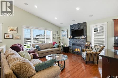 631 Ledingham Crescent, Saskatoon, SK - Indoor Photo Showing Living Room With Fireplace