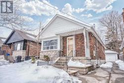 18 ROBLIN AVENUE  Toronto, ON M4C 3P8