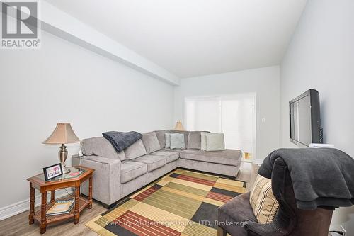 Living room with a large bright window - 427 Williams Crescent, Fort Erie (Lakeshore), ON - Indoor Photo Showing Living Room