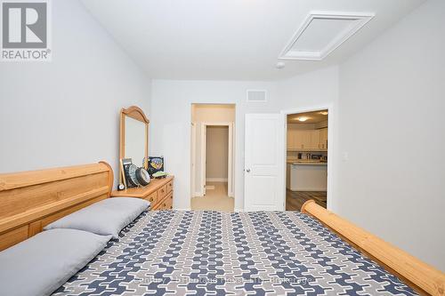 Main floor primary w/ his/hers closet and ensuite - 427 Williams Crescent, Fort Erie (Lakeshore), ON - Indoor Photo Showing Bedroom