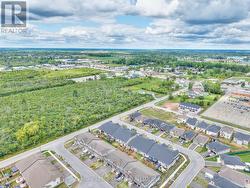 Aerial view of the property and surrounding area - 
