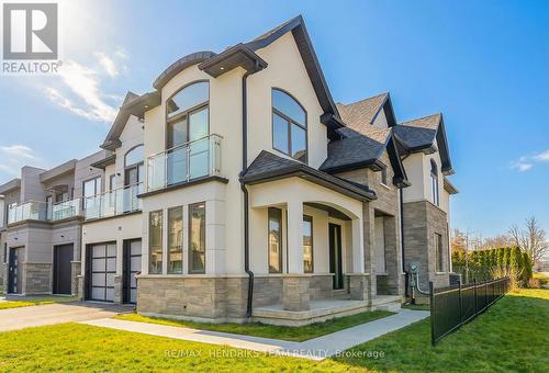 39 Sunrow Gate, Hamilton (Lakeshore), ON - Outdoor With Facade