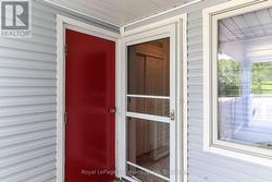 Front Door (with Screen Door) + Door to Storage - 
