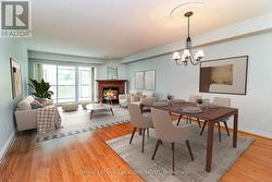 Virtually-Staged Dining Area (with view to Living) - 