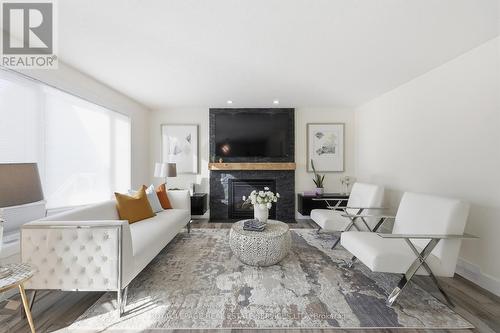 239 Rolling Acres Court, Kitchener, ON - Indoor Photo Showing Living Room With Fireplace