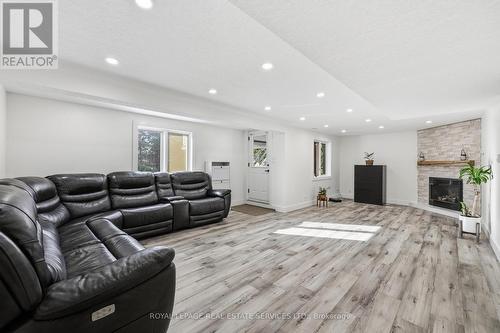 239 Rolling Acres Court, Kitchener, ON - Indoor Photo Showing Living Room With Fireplace