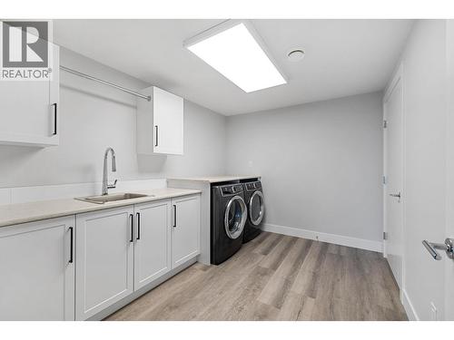1940 Foxtail Terrace, Kelowna, BC - Indoor Photo Showing Laundry Room