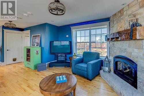 56 Pottles Lane, Upper Island Cove, NL - Indoor Photo Showing Living Room With Fireplace