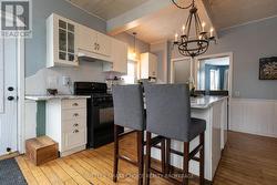 The back door leads into the large kitchen - 
