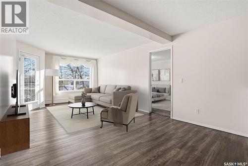 211 1735 Mckercher Drive, Saskatoon, SK - Indoor Photo Showing Living Room