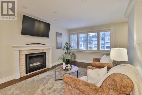 282 Pine Cove Road, Burlington, ON - Indoor Photo Showing Living Room With Fireplace