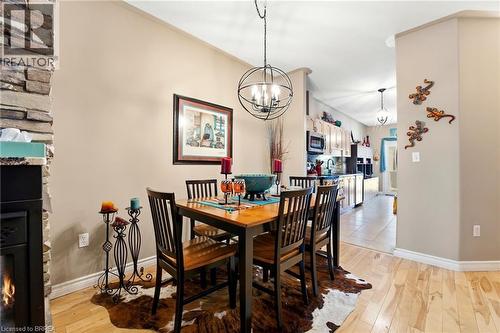 9 Millcroft Drive, Simcoe, ON - Indoor Photo Showing Dining Room With Fireplace