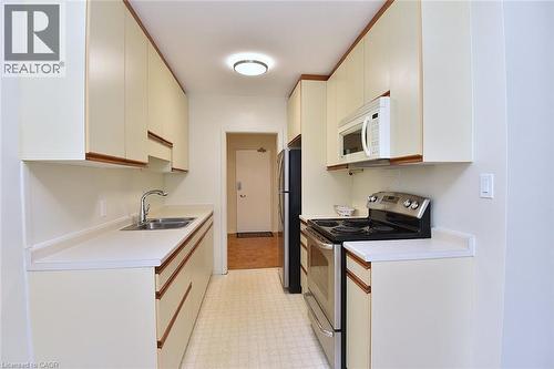 69 Herkimer Street Unit# 202, Hamilton, ON - Indoor Photo Showing Kitchen With Double Sink