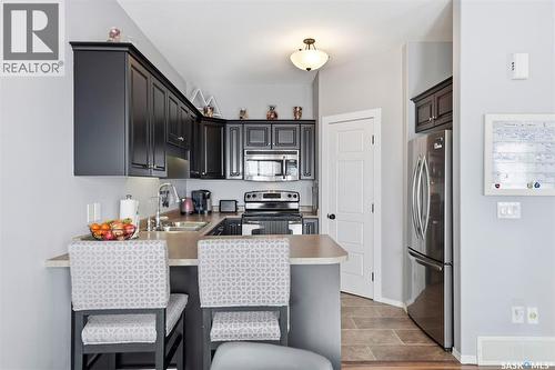 614 150 Langlois Way, Saskatoon, SK - Indoor Photo Showing Kitchen With Double Sink