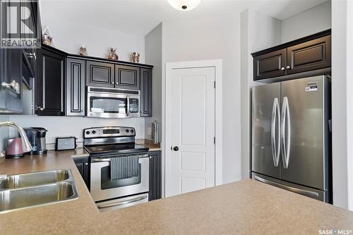 614 150 Langlois Way, Saskatoon, SK - Indoor Photo Showing Kitchen With Double Sink