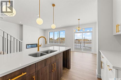 279 Nazarali Way, Saskatoon, SK - Indoor Photo Showing Kitchen With Double Sink