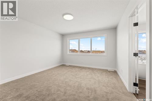 279 Nazarali Way, Saskatoon, SK - Indoor Photo Showing Other Room