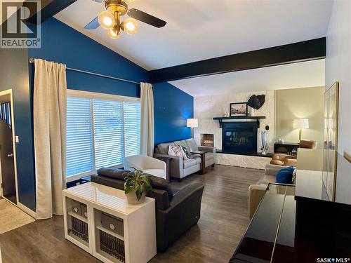 91 Moir Drive, Oxbow, SK - Indoor Photo Showing Living Room With Fireplace
