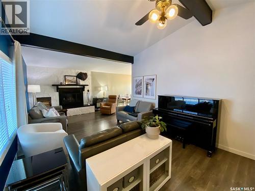 91 Moir Drive, Oxbow, SK - Indoor Photo Showing Living Room With Fireplace