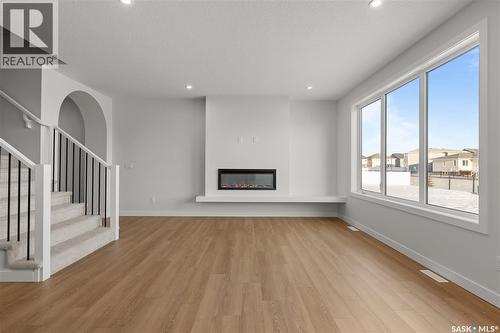 938 Brighton Gate, Saskatoon, SK - Indoor With Fireplace